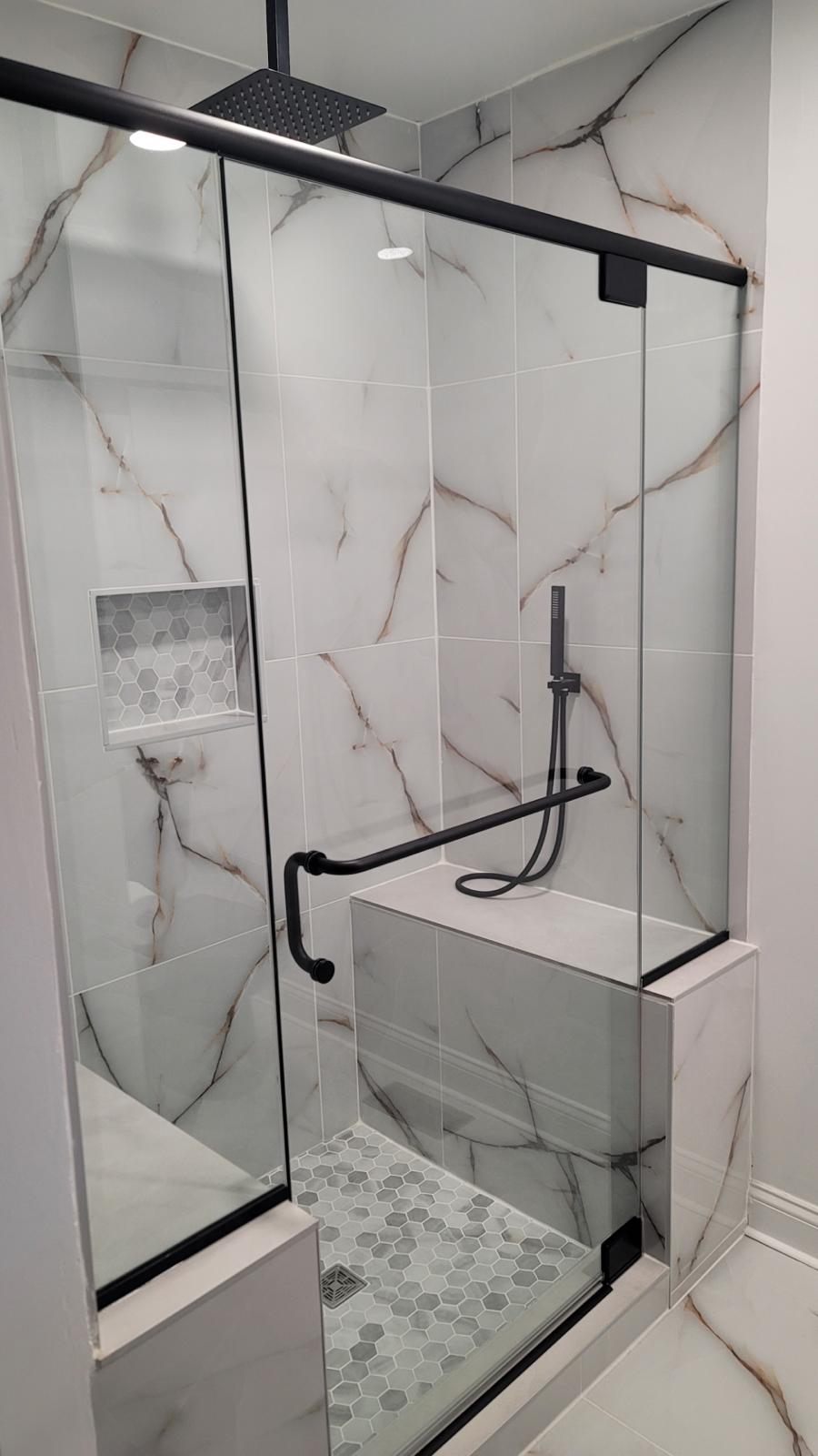 Melanoid Castano Silver Tile – High-Gloss Installed Elegance
See the Melanoid Castano Silver Polished Porcelain Tile beautifully installed, showcasing its high-gloss finish and stunning silver tones. This tile enhances any space, making it perfect for living rooms, kitchens, and bathrooms. Its sophisticated design, combined with durability and scratch resistance, ensures long-lasting elegance. Transform your interiors with the luxurious appeal of the Melanoid Castano Silver tile, creating an inviting.